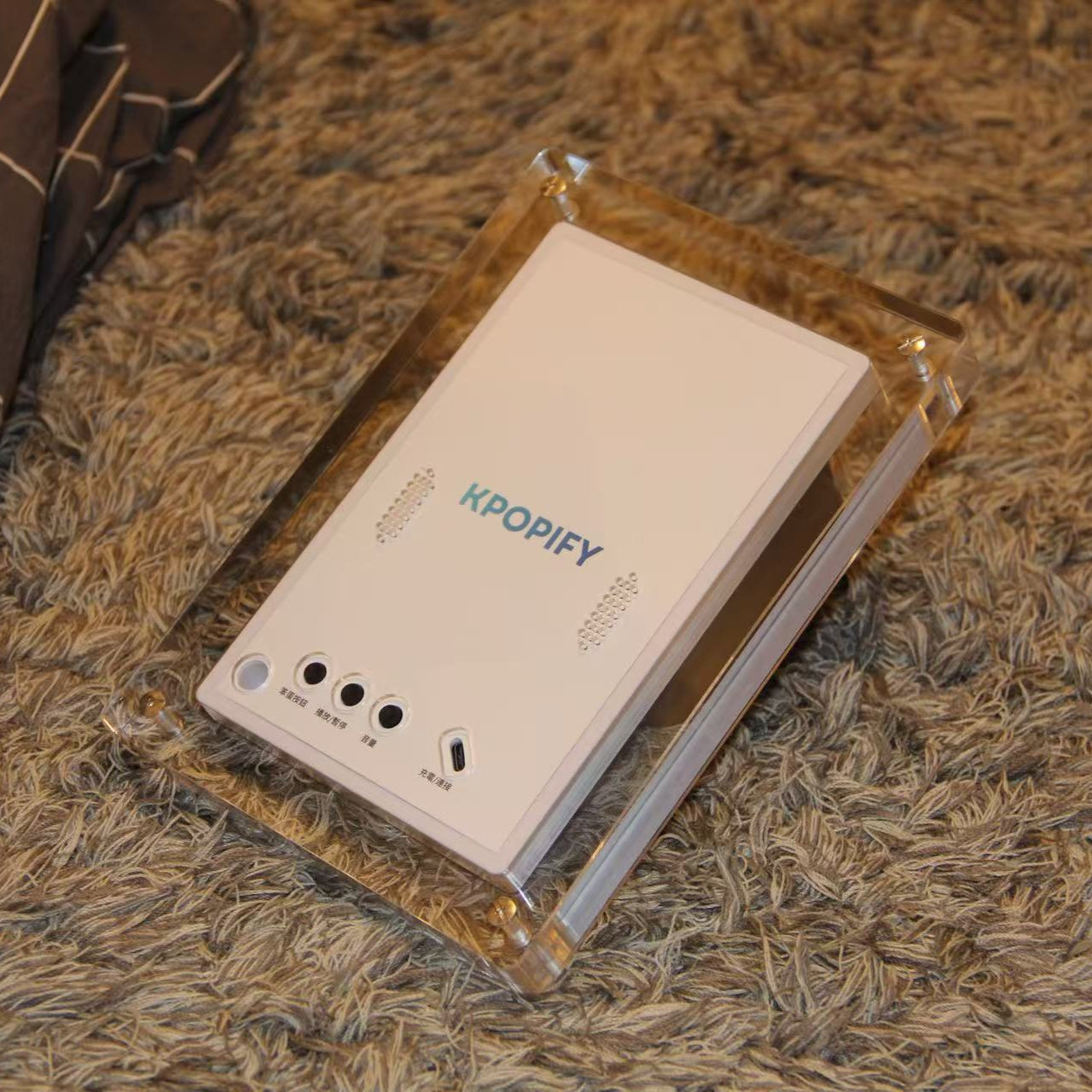 KPOPIFY Poster 7-inch digital K-pop video frame in clear acrylic case, back view with control buttons